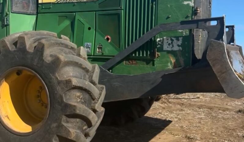 
								Deere 648L full									