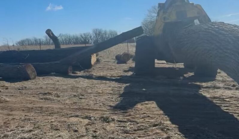 
								Deere 648L full									